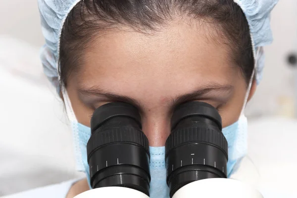At the microscope — Stock Photo, Image
