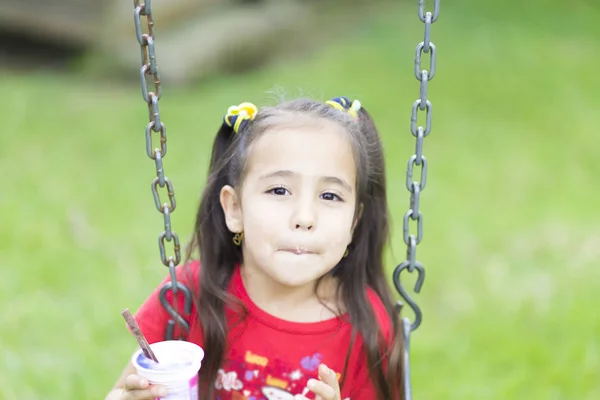 Happy Girl Drinking Milk or Yogurt — Stock Photo, Image