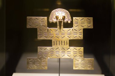 Güney Amerika yerlilerinden altın bir süs. 