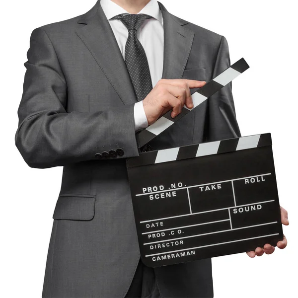 Man wearing costume holding clapper board — Stock Photo, Image