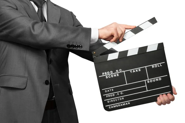 Man wearing costume holding clapper board — Stock Photo, Image