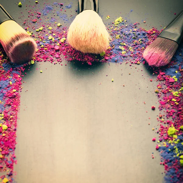 Makeup brushes on colorful background — Stock Photo, Image