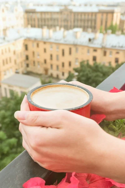 Close-up of woman drinking coffee on balcony outdoors — Stock Photo, Image