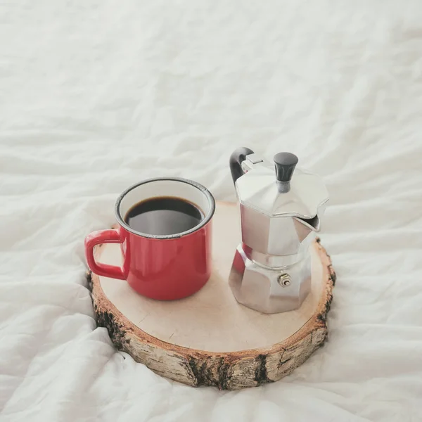 Coffee mug with maker on wooden tray — Stock Photo, Image