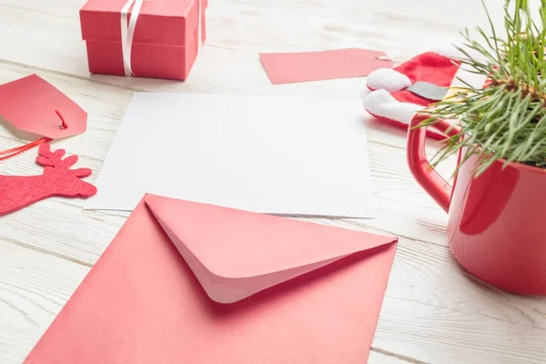 Envelope with Christmas items — Stock Photo, Image