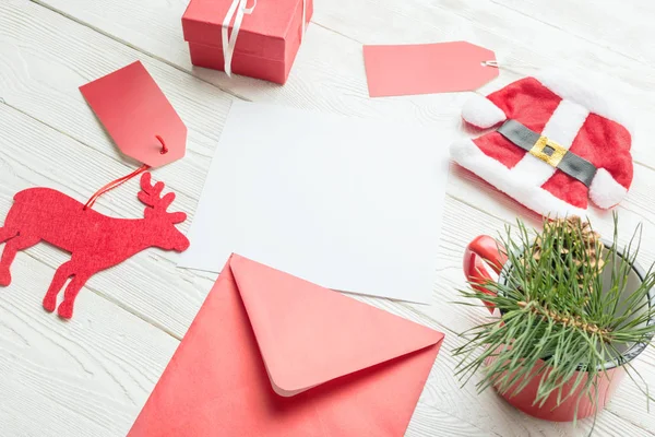 Envelope with Christmas items — Stock Photo, Image