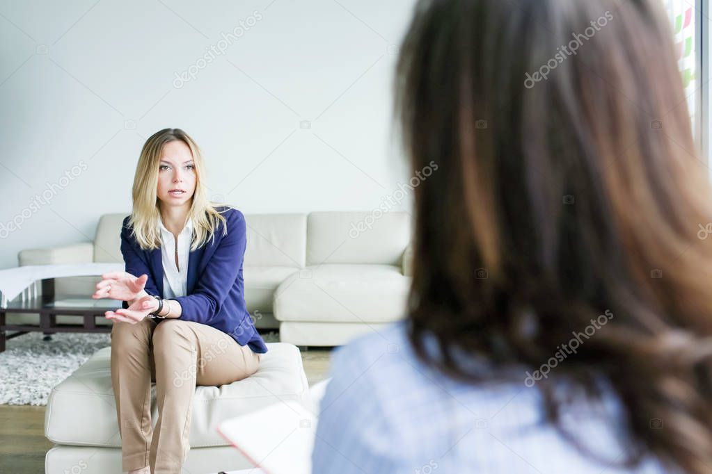 Young woman having a job interview with a hiring manager