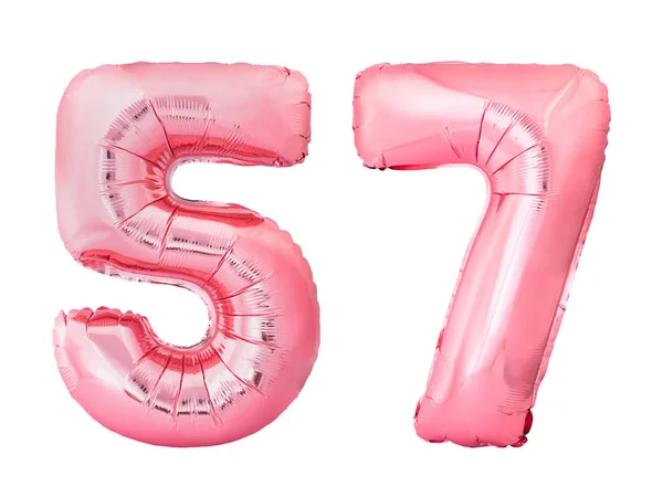 Número 57 cincuenta y siete hecho de globos inflables de oro rosa aislados sobre fondo blanco — Foto de Stock