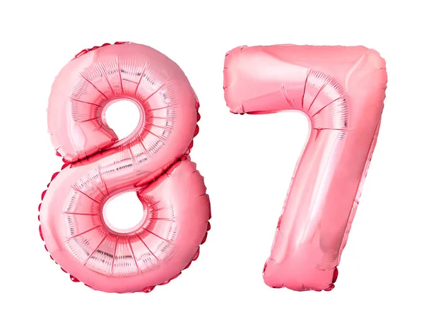 Número 87 oitenta e sete de ouro rosa balões infláveis isolados no fundo branco — Fotografia de Stock