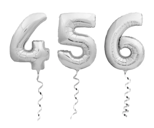 Números de prata 4, 5, 6 feitos dos balões infláveis com fitas douradas isoladas no branco — Fotografia de Stock