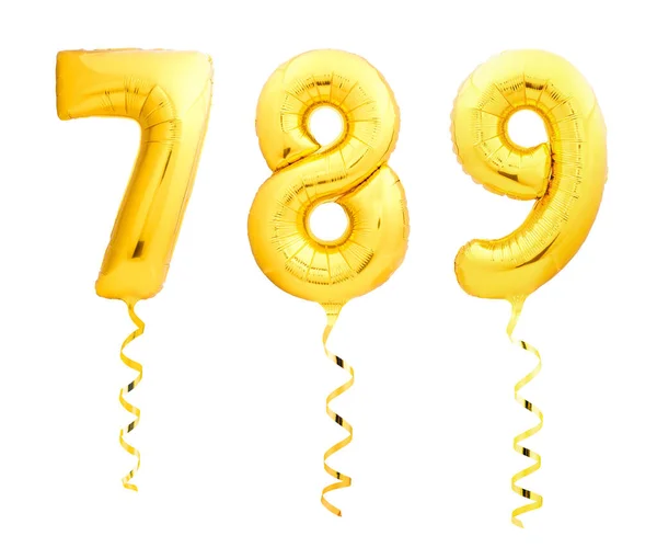 Golden numbers 7, 8, 9 made of inflatable balloons with golden ribbons isolated on white — Stock Photo, Image