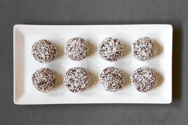 Coconut Rum Balls Plate Photographed Overhead Slate Natural Light Selective — Stock Photo, Image