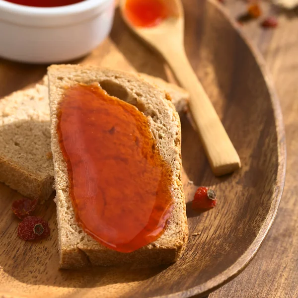 Homemade Rose Hip Jam Wholegrain Bread Slice Wooden Plate Spoon — Stock Photo, Image