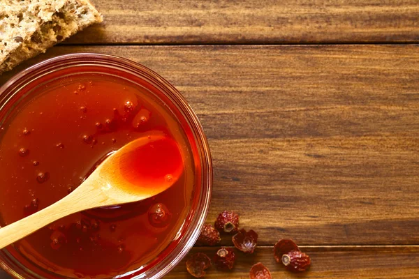 Homemade Rose Hip Jam Glass Bowl Wooden Spoon Photographed Overhead — Stock Photo, Image