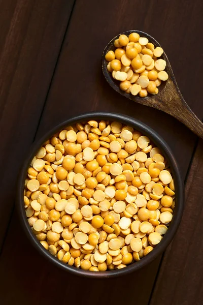 Raw Yellow Split Peas Small Bowl Photographed Overhead Dark Wood — Stock Photo, Image