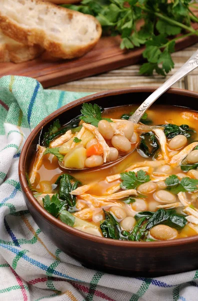Chicken soup with beans — Stock Photo, Image