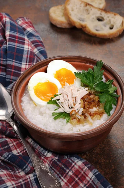 Rice  porridge with egg — Stock Photo, Image