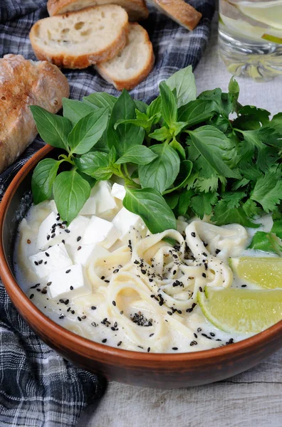 Rice soup with noodles and tofu — Stock Photo, Image