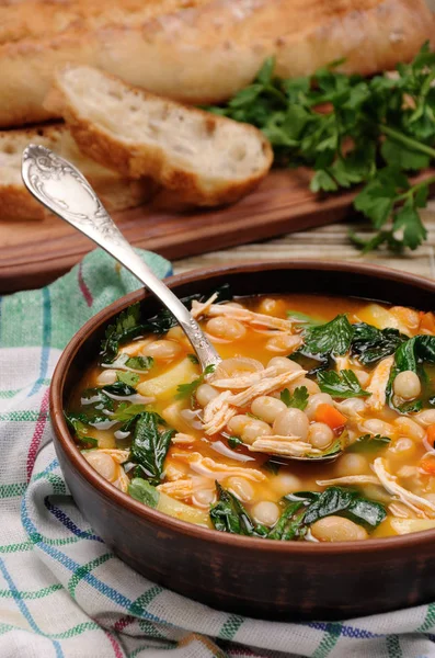 Chicken soup with beans — Stock Photo, Image