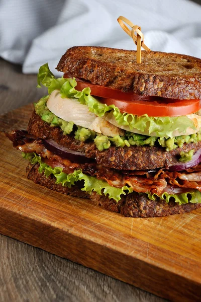 Double sandwich with chicken and bacon — Stock Photo, Image