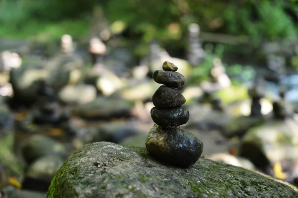 Stones on river shore — Stock Photo, Image