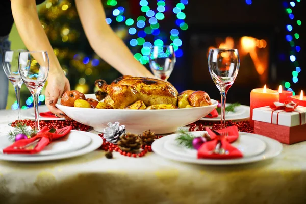 Woman holding Christmas dinner — Stock Photo, Image