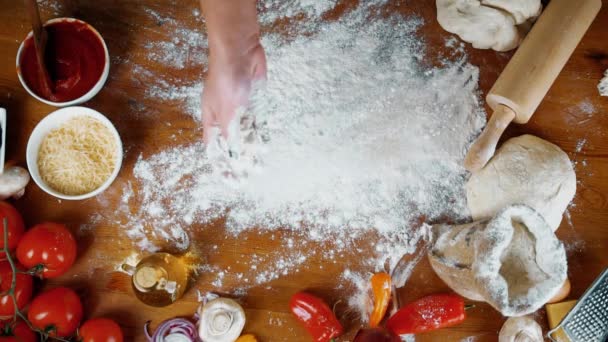 Prepearing dough for homemade pizza — Stock Video