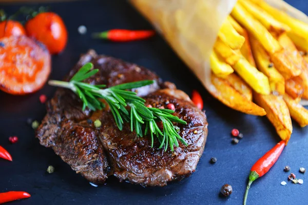 French fries and steak — Stock Photo, Image