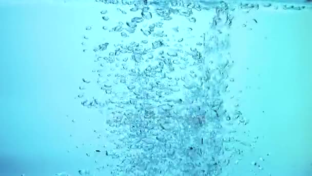 Burbujas en agua cámara lenta — Vídeos de Stock