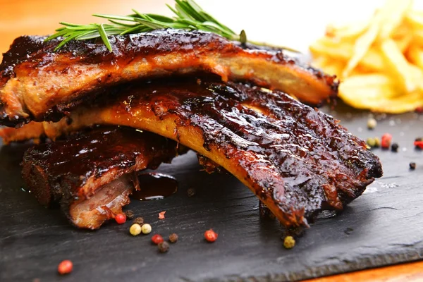 Potatoes and pork ribs — Stock Photo, Image