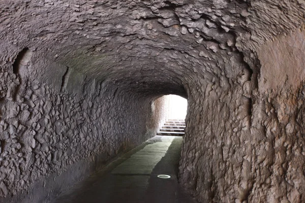 Tunnel with walls made of stone — Stock Photo, Image