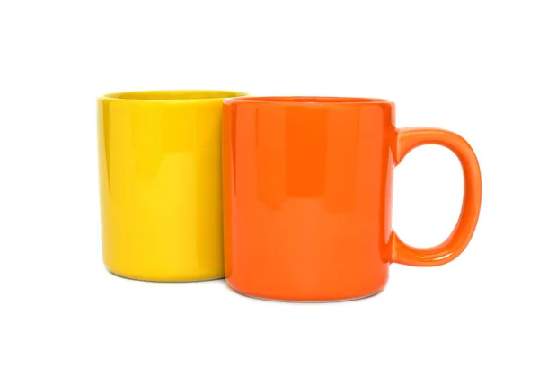 Due tazze vuote di colore isolato — Foto Stock