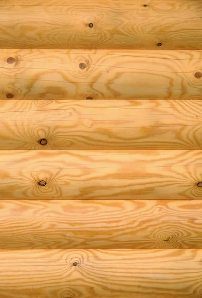 Achtergrond van horizontale hakte geschilderd houten logboeken — Stockfoto