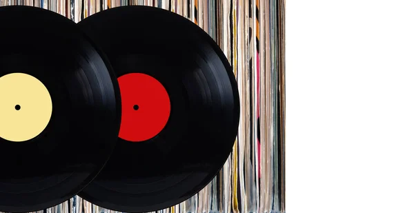 Twee Zwarte Vinyl Platen Met Kleurenlabels Voor Plank Van Vele — Stockfoto