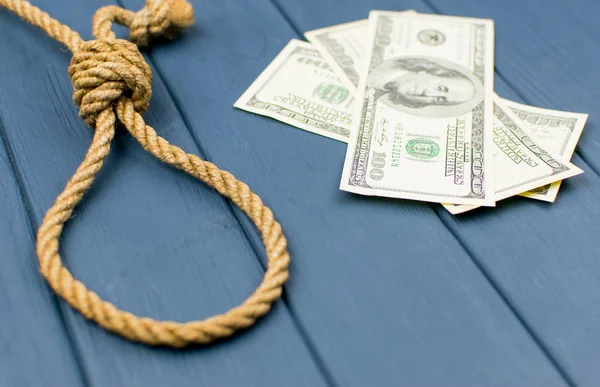 Gallows, rope loop. The concept of suicide because of money.