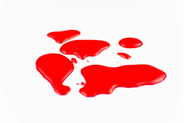 Potůčky krve na bílém pozadí. — Stock fotografie