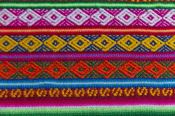 Andes textiel in de wol van alpaca en blad — Stockfoto