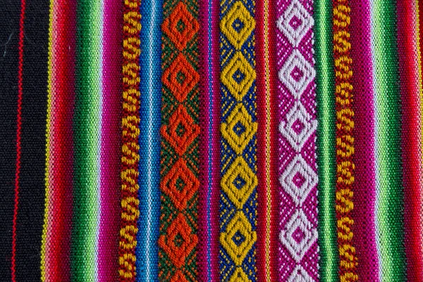 Andes textiel in de wol van alpaca en blad — Stockfoto