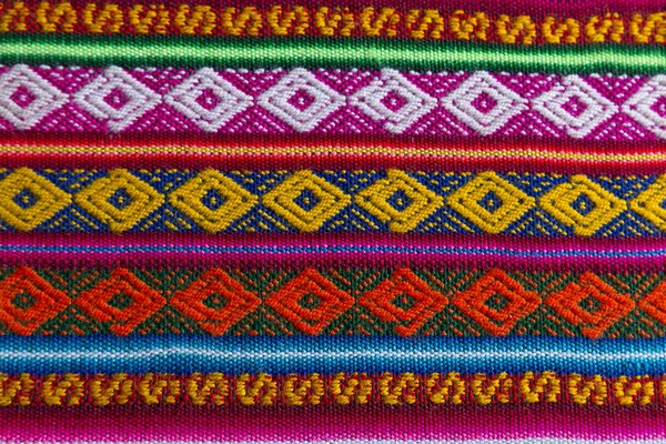 Andes textiel in de wol van alpaca en blad — Stockfoto