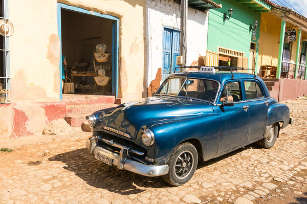 American classic car in Trinidad city. UNESCO World Heritage Sit