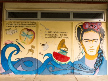 Graffiti in honor Frida Kahlo at the Universidad Austral de Chil clipart