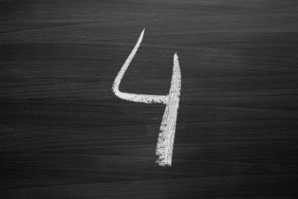 Number four enumeration written with a chalk on the blackboard — Stock Photo, Image