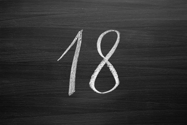 Number eighteen enumeration written with a chalk on the blackboard — Stock Photo, Image