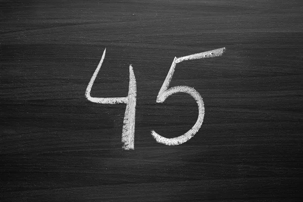 Number forty five enumeration written with a chalk on the blackboard — Stock Photo, Image