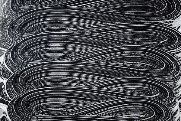 Seifenwaschschwamm Flecken auf schwarzem Hintergrund — Stockfoto