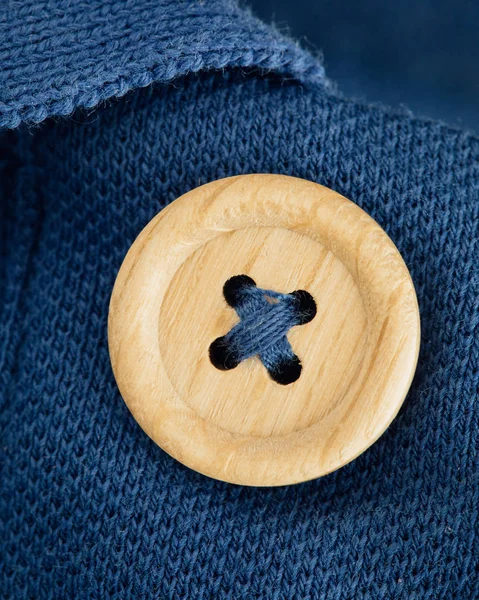 Button on a polo t-shirt fabric texture — Stock Photo, Image