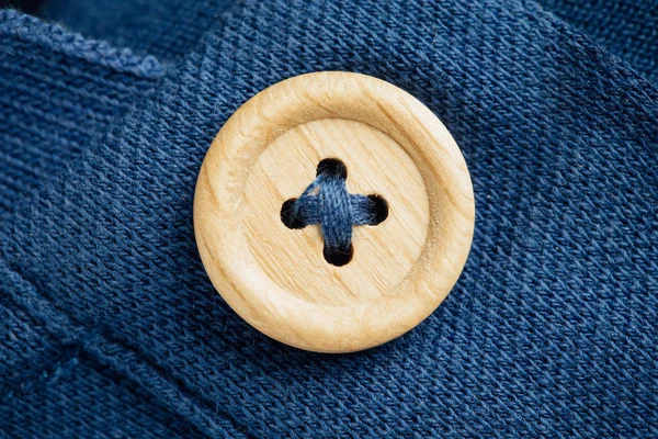 Button on a polo t-shirt fabric texture — Stock Photo, Image