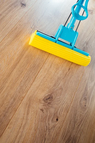 Floor cleaning with a mop — Stock Photo, Image