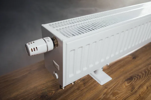 Heating radiator with warm steam — Stock Photo, Image