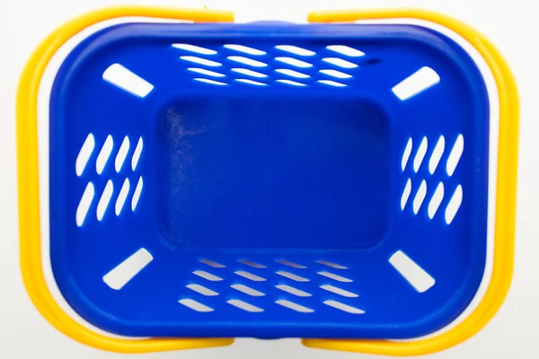 Pusty niebieski koszyk na zakupy, widok z góry — Zdjęcie stockowe